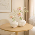 Ronde witte vaas slagroom in polyresine 30x30x22cm